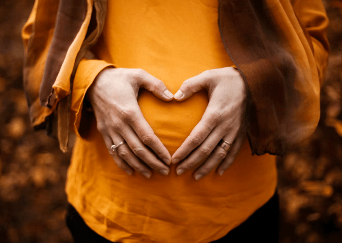 woman holding stomach